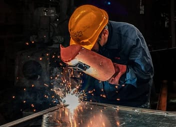 man welding