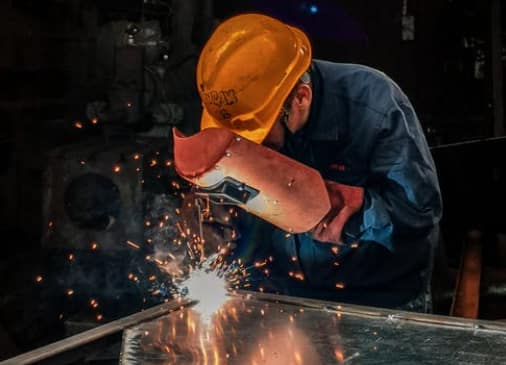 man welding
